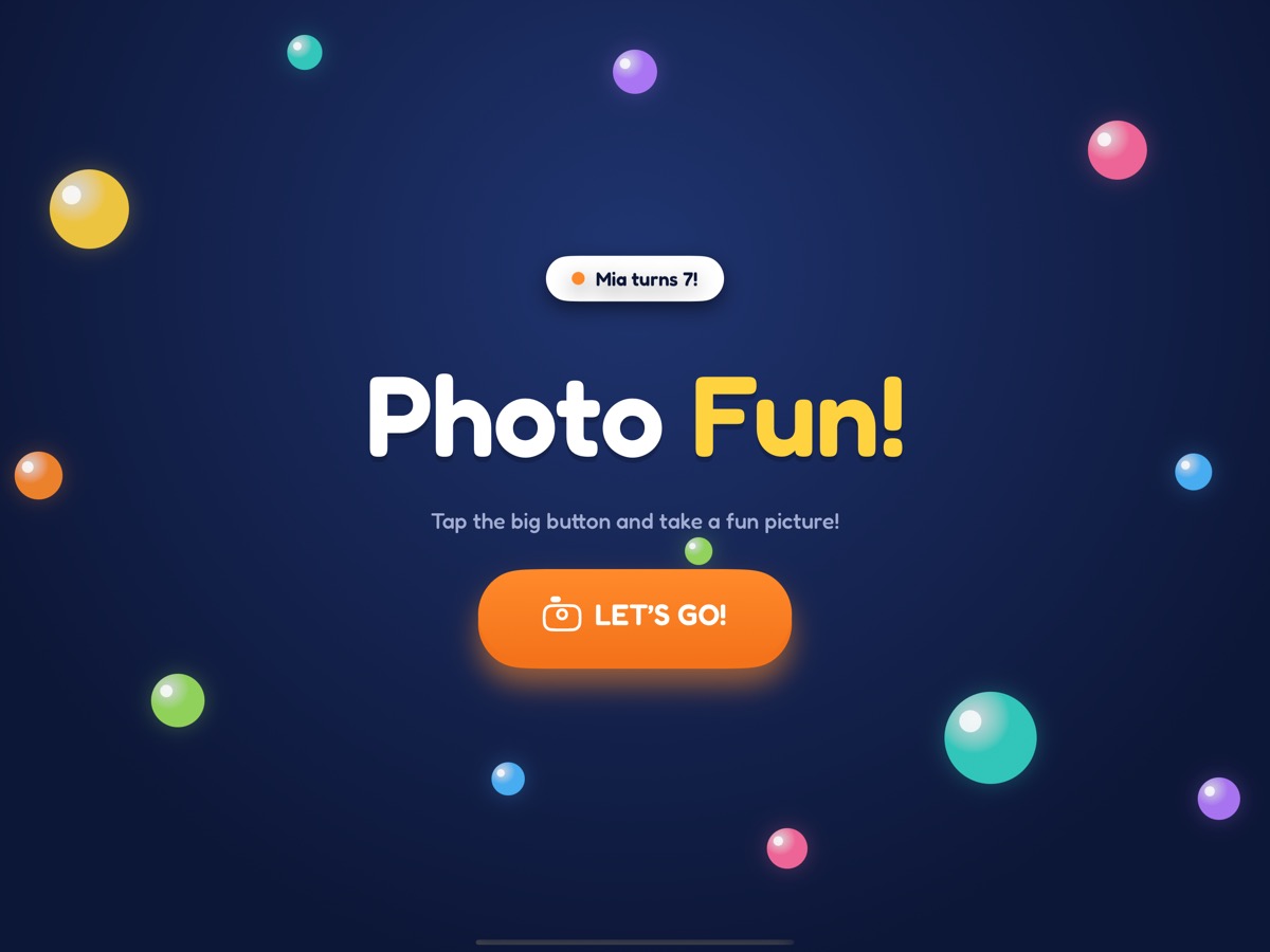Idle screen in the Birthday design: “Photo fun!” with the event name and a big “Let’s go!” button